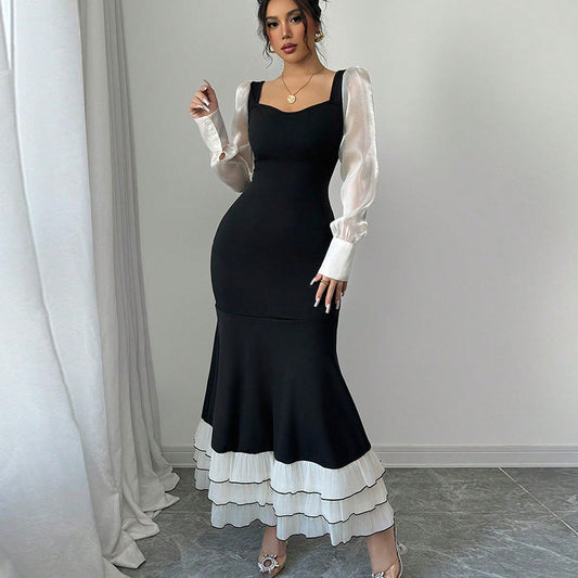 Damen Maxikleid mit Puffärmeln und Rüschensaum Eveloria - Eveloria