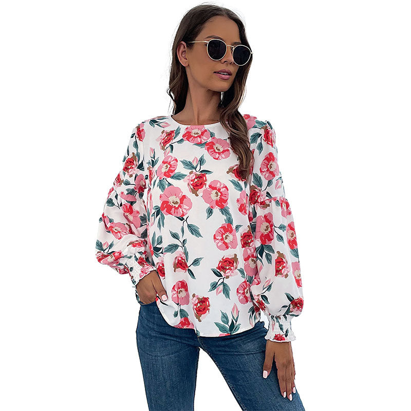 Damen Bluse mit Volumenärmel Floralmuster Eveloria