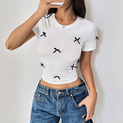 Damen Cropped T-Shirt mit Schleifenmotiv
