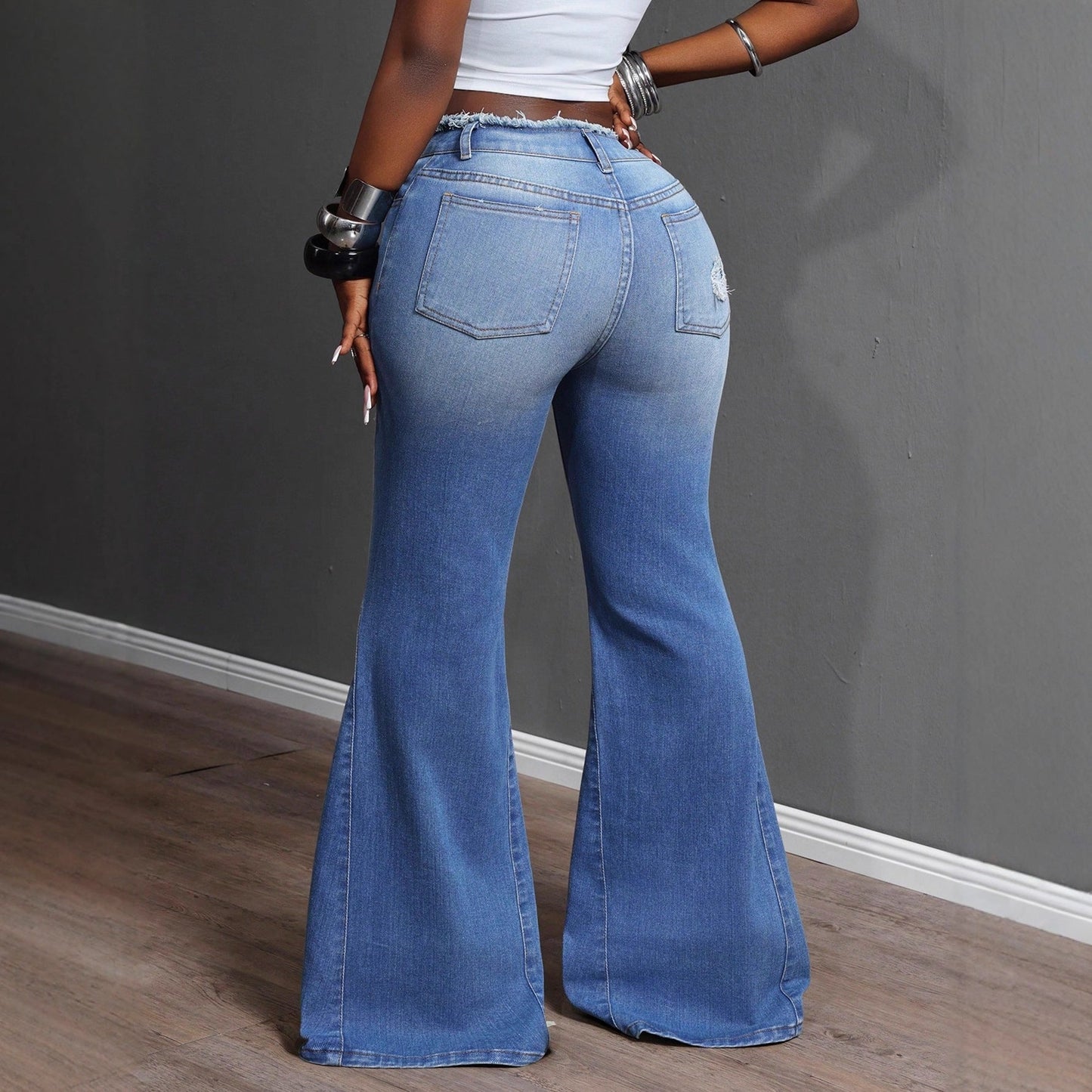 Damen Bootcut Jeans Ausgefranste Details Eveloria