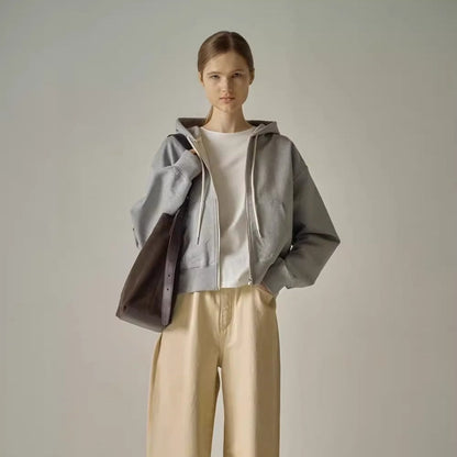 Damen Kapuzen-Sweatjacke Reißverschluss Taschen Eveloria