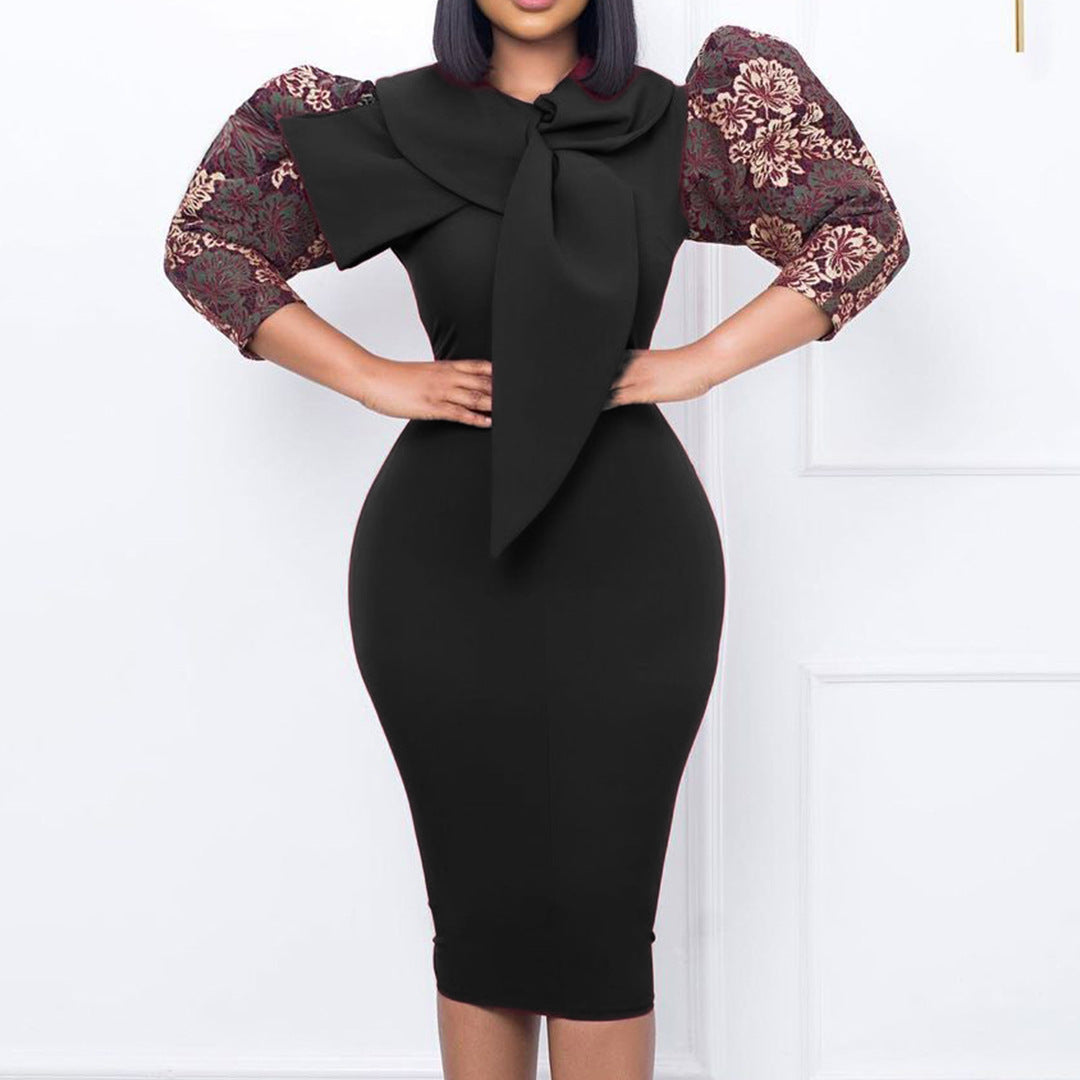 Damen Kleid mit Statement-Kragen und floralem Ärmel Eveloria - Eveloria