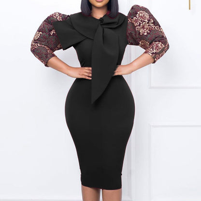 Damen Kleid mit Statement-Kragen und floralem Ärmel Eveloria - Eveloria