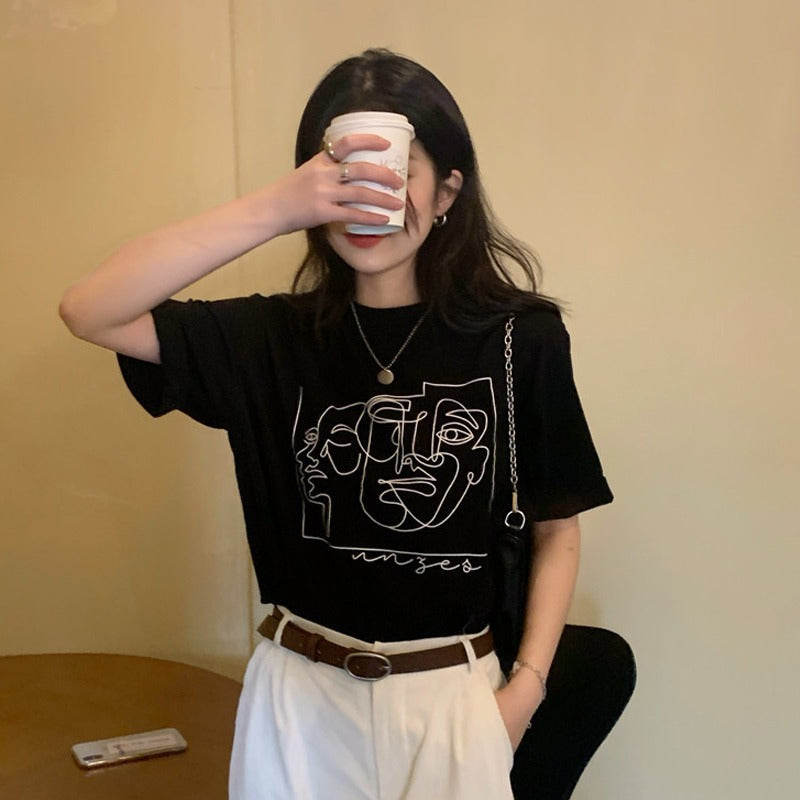 Damen T-Shirt mit Linienkunst-Motiv und lässiger Passform Schwarz - Eveloria