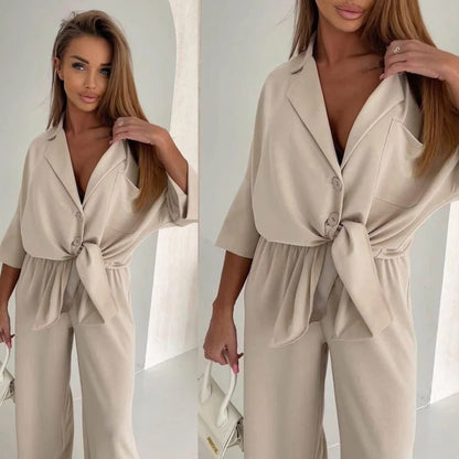 Damen Jumpsuit mit Bindegürtel und weiten Beinen Eveloria