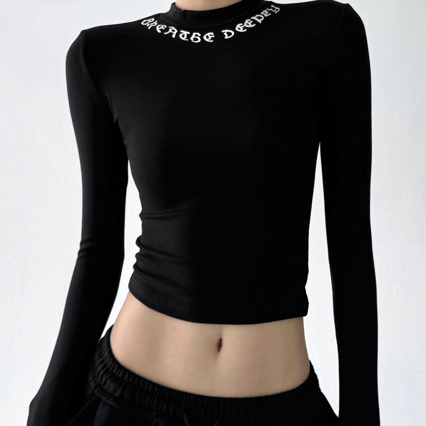 Damen Langarmshirt Figurbetont Hochkragen Mit Schriftzug