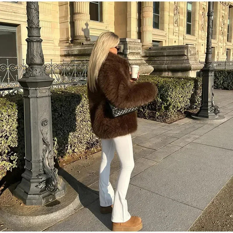 Damen Kunstpelzjacke Voluminöse Ärmel Eveloria