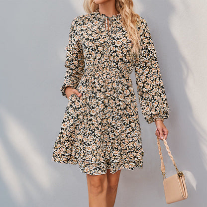 Damen Blusenkleid mit floralem Muster und Volumenärmeln - Eveloria