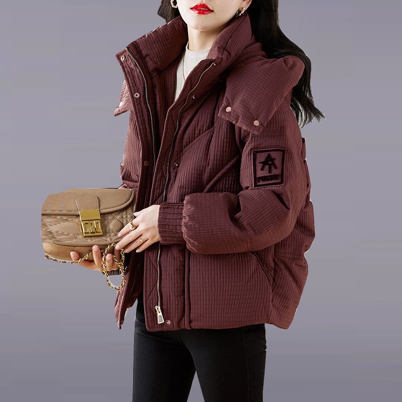 Damen Oversized Steppjacke mit Kapuze und praktischem Design