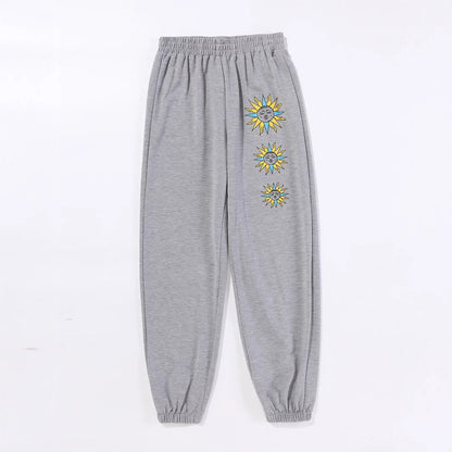 Damen Sweatpants Bequem Sonnenmotiv Trend Eveloria