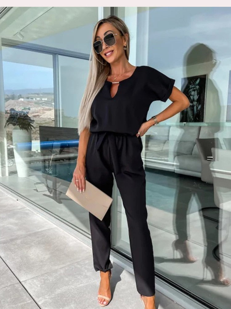 Eveloria Damen Jumpsuit Kurzärmelig Mit Gürtel