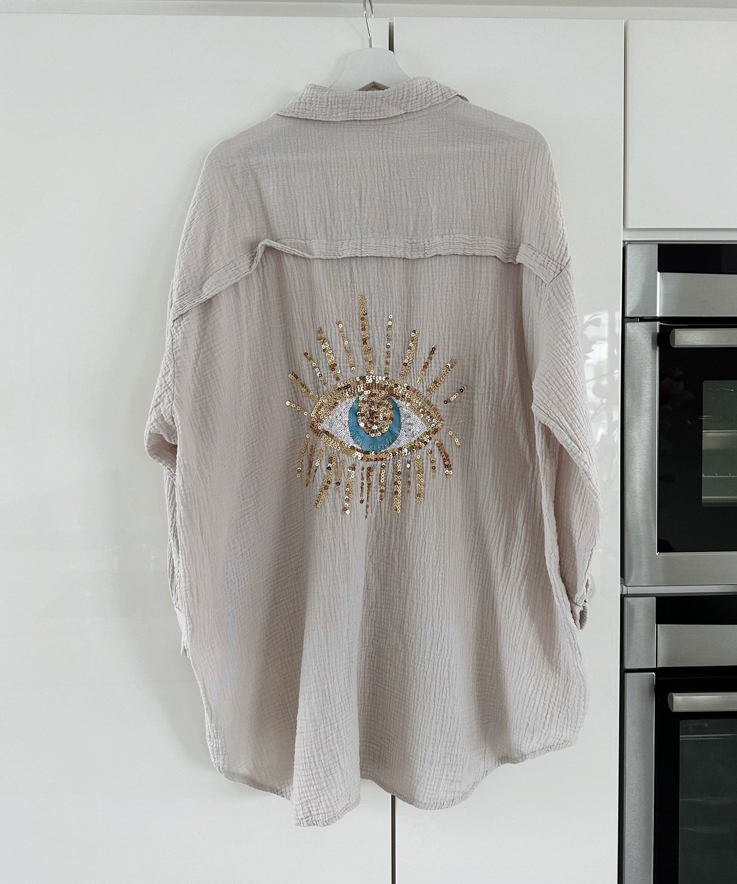 Eveloria Damen Oversize Bluse aus Musselin mit Glitzer und Auge Beige