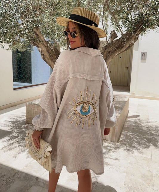 Eveloria Damen Oversize Bluse aus Musselin mit Glitzer und Auge Beige - Eveloria